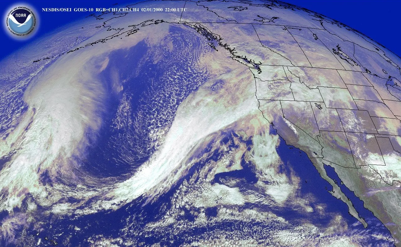 GOES satellite view of a long plume of jet-stream moisture curling across the Pacific toward the US West Coast.