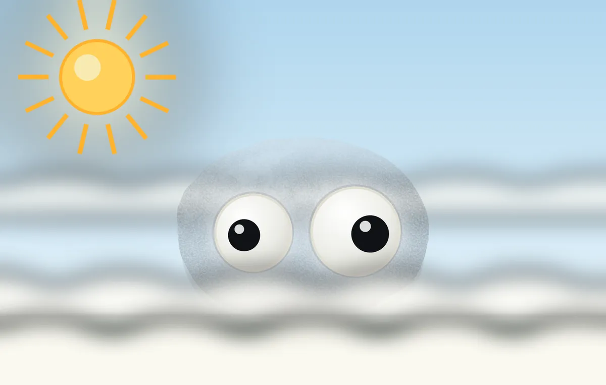 The weather rock in soft white fog with its big googly eyes showing, while a bright sun burns through above.
