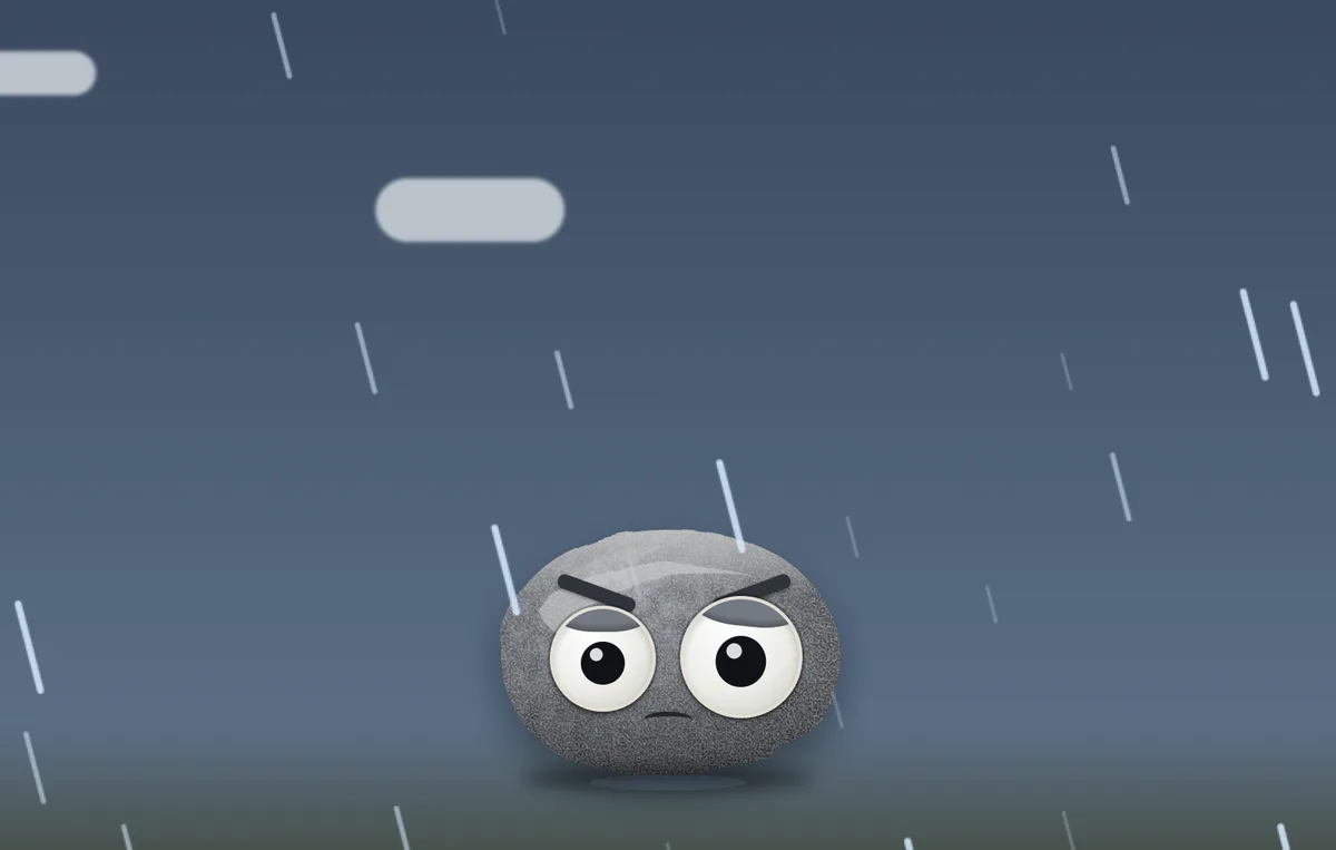 The weather rock outside under rain falling, waiting to be looked at.