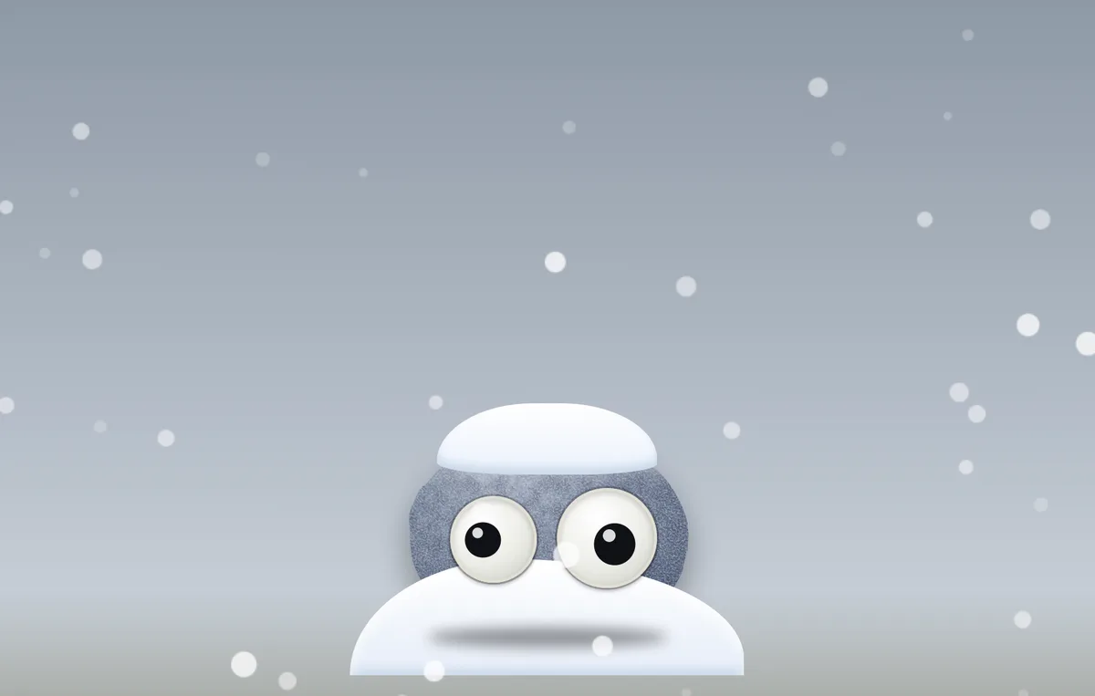 The weather rock wearing a cap of snow while flakes fall around it.